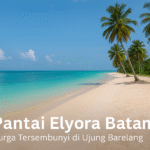 Pantai Elyora Batam dengan pasir putih dan laut biru jernih di bawah langit tropis.